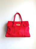 Front view of fire-engine red Mulberry Bayswater in lizard-embossed leather with gold-tone Postman's Lock